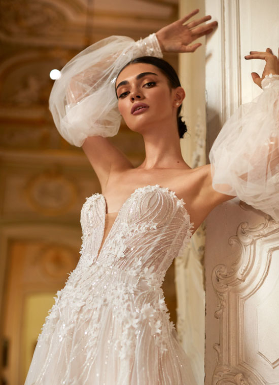 Model wearing an Enzoani dresses