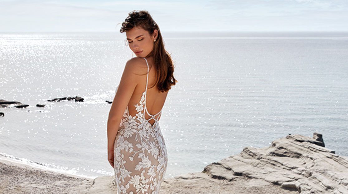 Model wearing an Enzoani dresses